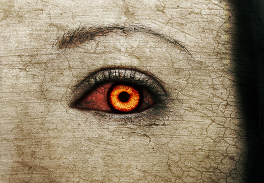 Evil bloody female zombie eyes. dirt make up. Macro. Halloween 