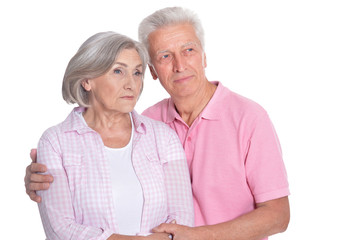 Happy elderly couple embracing