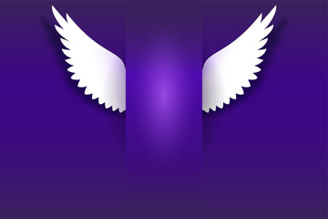 Angel wings hovering in the dark. Card with white angelic wings with place for your text