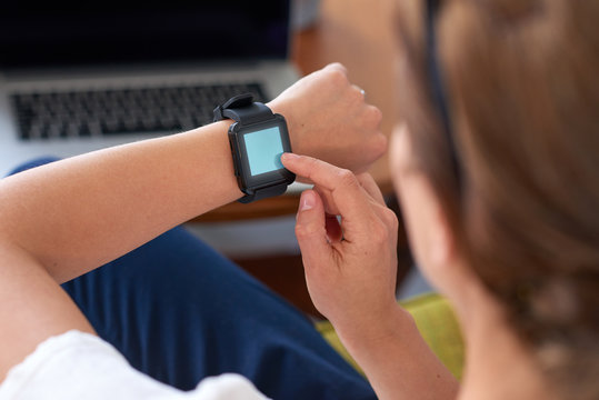 Modern business woman with smartwatch