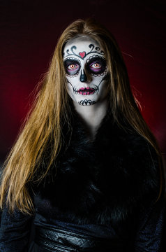 girl in a make-up posing in studio Halloween