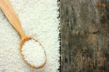 Rice on the old wooden background