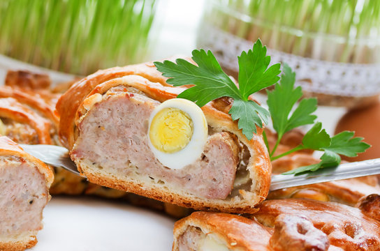 Baked meatloaf in dough with eggs, Easter brunch recipe
