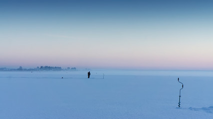 Dawn on winter fishing.