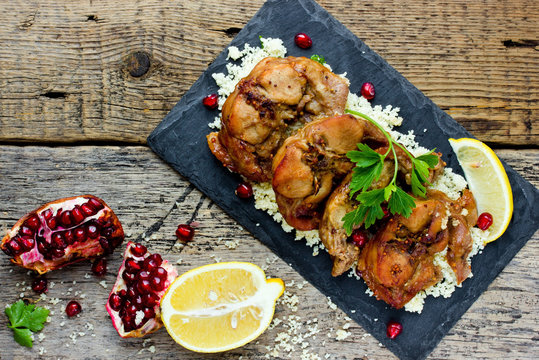Roast rabbit with couscous in oriental style