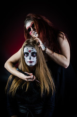 Obraz premium two girls in halloween makeup