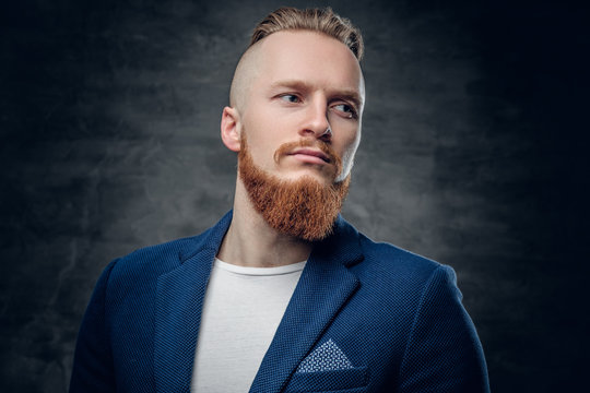 Redhead Hipster Male Dressed In A Blue Jacket.