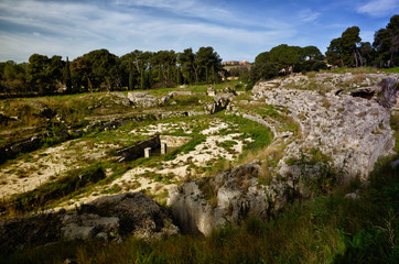Fototapeta na wymiar Ruins of the Roman amphitheater in Syracuse Neapolis