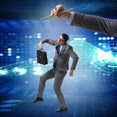 Businessman puppet being manipulated by boss