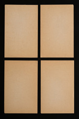 Brown paper sheets isolated on black background