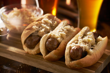 german bratwursts and sauerkraut with beer