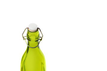 Old green glass bottle isolated on white background olive oil. White plastic cork and ply rusty...