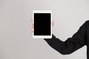 Man Holding Digital Tablet On White Background
