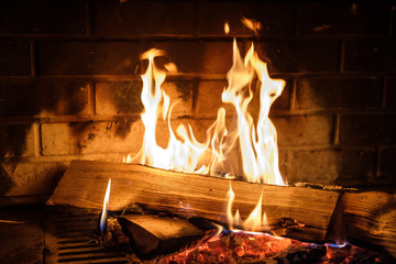 fire burns in the fireplace