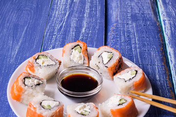 Philadelphia Maki Sushi made of Fresh Raw Salmon, Cream Cheese and Cucumber