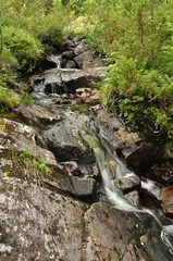 Fototapeta premium Waterfall in Rollonhytte Vardane, Norway 2013