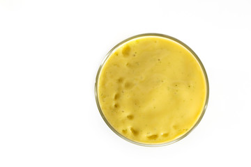 Glass of fresh healthy smoothie isolated on white background