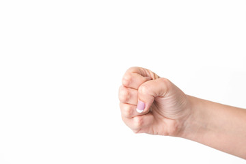 Closeup of female caucasian hand isolated on white background. Young woman forms fist. Horizontal color photography.