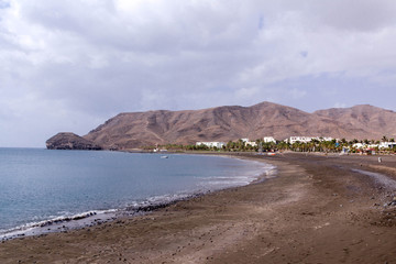 Fototapeta na wymiar Black sand volcanic beach in Las Playitas village, Fuerteventura, Canary Islands, Spain