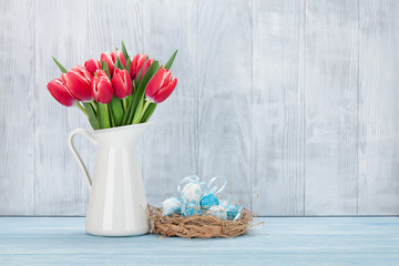 Easter eggs and tulips bouquet