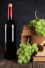 Red wine and white grapes