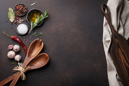 Cooking table with herbs, spices and utensils