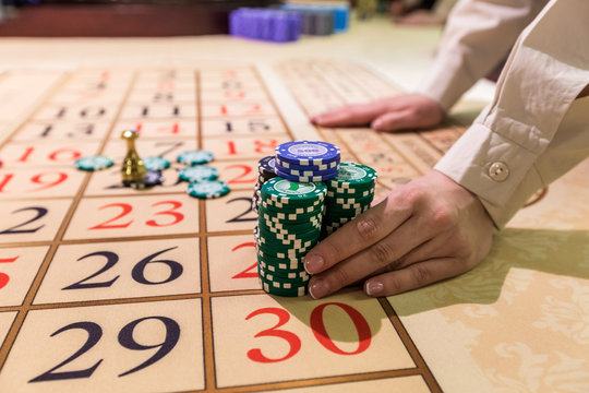 gambling chips on a game table roulette