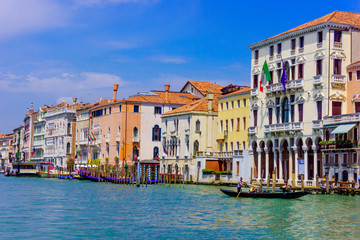 Fototapeta na wymiar VENICE, ITALY - June 01, 2014.View of water street and old buildings in Venice. Canal in Venice, Italy. Architecture and landmarks of Venice
