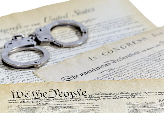 US Constitution Historical Documents with handcuffs