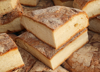 homemade bread cooked in a wood oven on sale in market stall