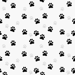 Fototapeta premium Paw print seamless. Traces of Cat Textile Pattern. Vector seamless
