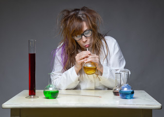 Funny shaggy scientist in lab