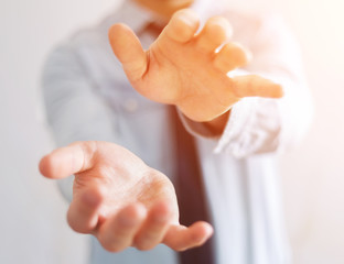 Businessman showing his empty hand