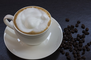 Hot coffee in a white cup