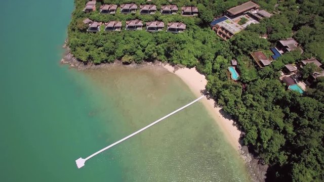 Drone Approach Shot Towards Sri Panwa and Luxury Villas in Phuket Thailand
