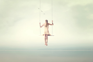 surreal woman suspended in the air