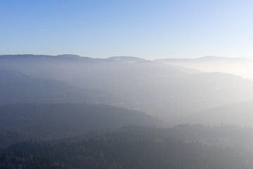 Fototapeta premium View from Yburg castle in direction Mehliskopf with fog in the valley