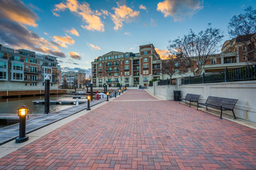 The Waterfront Promenade and waterfront residences at sunset, at the Inner Harbor in Baltimore, Maryland.