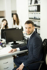 Fototapeta premium Young people in the modern office