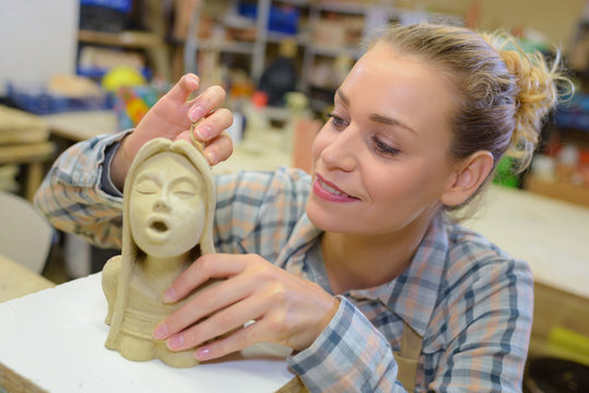 Woman sculpting