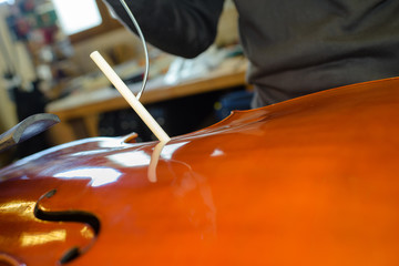 Closeup of violin being made