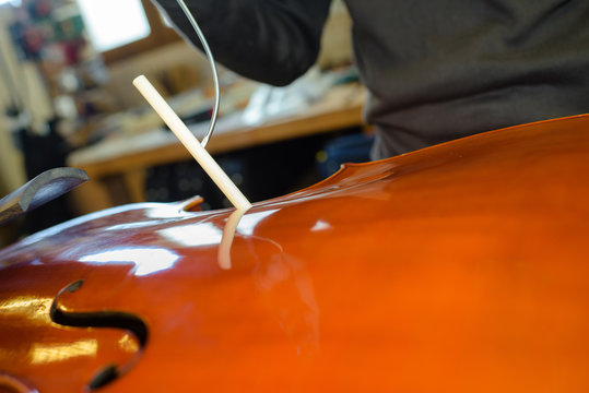 Closeup of violin being made