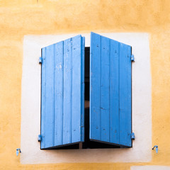 Typical wooden and blue window at Provence,France