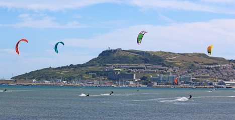kitesurfers in Portland harbour