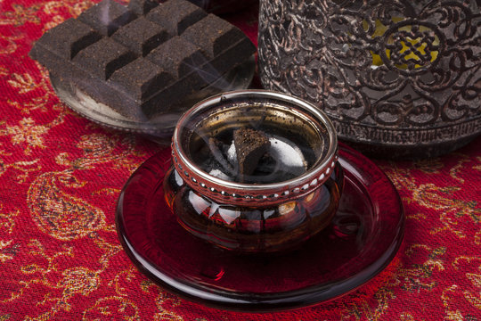 In most Arab countries incense is burned in the form blocks or scented chips called bukhoor or bakhoor