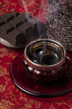 In most Arab countries incense is burned in the form blocks or scented chips called bukhoor or bakhoor