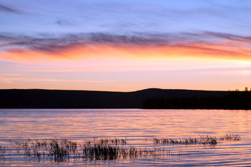 Sunset and dusk on the lake. Lake Labynkyr. Yakutia. Russia.