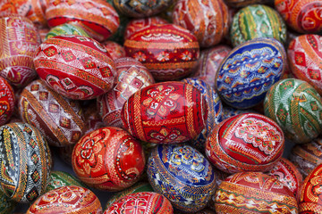 Traditional ukrainian wooden easter eggs in a street market.