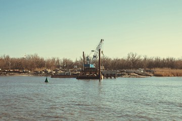 Construction of a bridge across the river. Stock image.