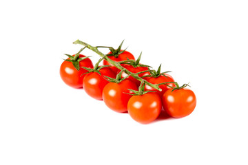 Red cherry tomatoes isolated on white background